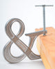 The Adjustable Clampersand