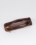 Red Clouds Collective Round Pencil Case
